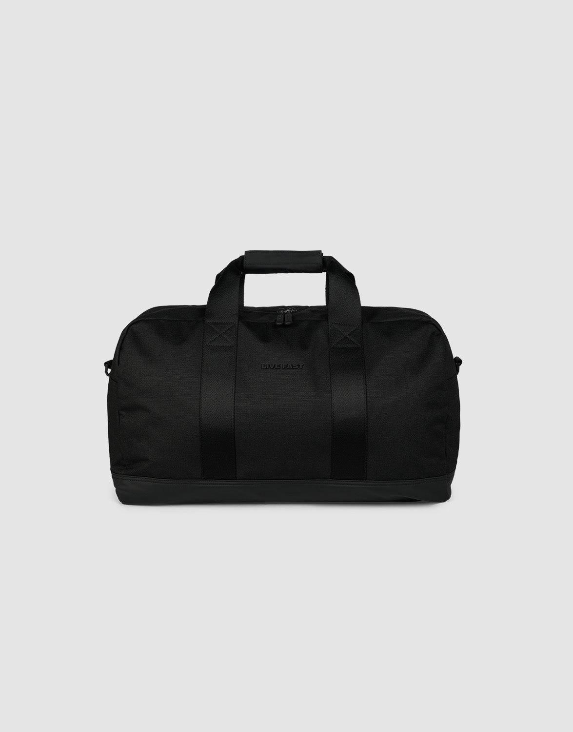 The LFDY Weekender 50 by LIVE FAST DIE YOUNG is a black polyester duffel bag with two carrying handles, a detachable shoulder strap, and a zippered top, shown against a plain light gray background.
