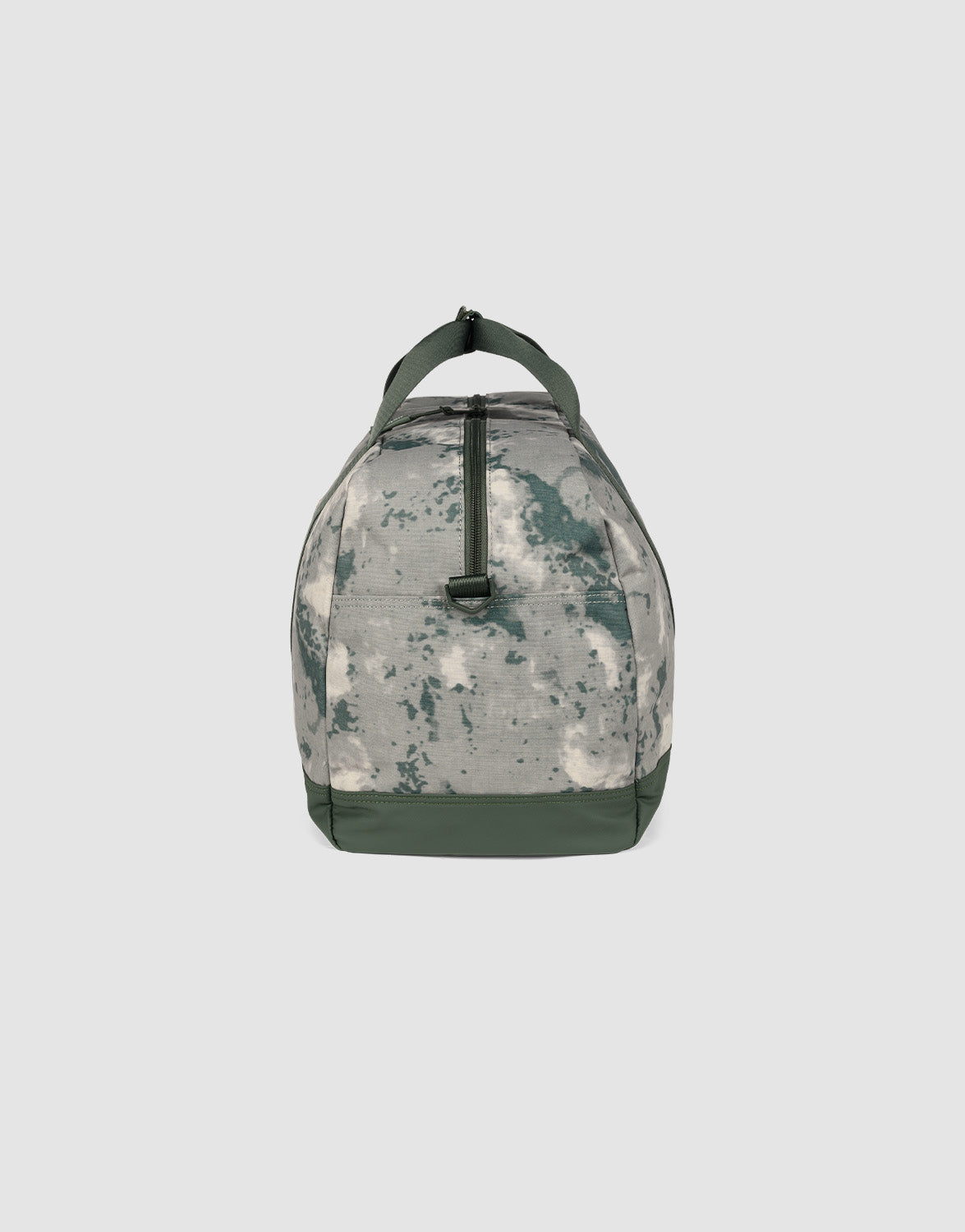 The LIVE FAST DIE YOUNG LFDY Weekender 50 is a green and gray tie-dye duffel bag with green handles, a central zipper, and a spacious main compartment, shown upright against a plain light gray background.