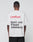 A person with short hair is seen from behind in a white Basic Trademark Tee by LIVE FAST DIE YOUNG, made of 100% cotton. The oversize fit features LiveFast in red and bold black Sport- und Freizeitbekleidung on the back.