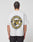 A person with braided hair wears the LFDY Circle Dog Tee by LIVE FAST DIE YOUNG, an oversize fit, light gray T-shirt with a vintage wash. Its back shows a snarling dog and bold yellow “LIVE FAST DIE” and “BEWARE OF DOGS” circular graphics.