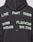 The Live Fast District Hooded Zip by LIVE FAST DIE YOUNG is a black oversized hoodie featuring white spray-painted text: “LIVE FAST DIE YOUNG,” “SOHO,” “MARIA’S,” “FLINGERX,” and “INC. 235.” LFDY branding appears on the upper back.