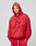 A man wears the LIVE FAST DIE YOUNG LFDY IV Ever Hooded, a red oversize hoodie with Vintage Waschung and bold LIVE FAST 4 EVER text, paired with matching red pants against a plain background.