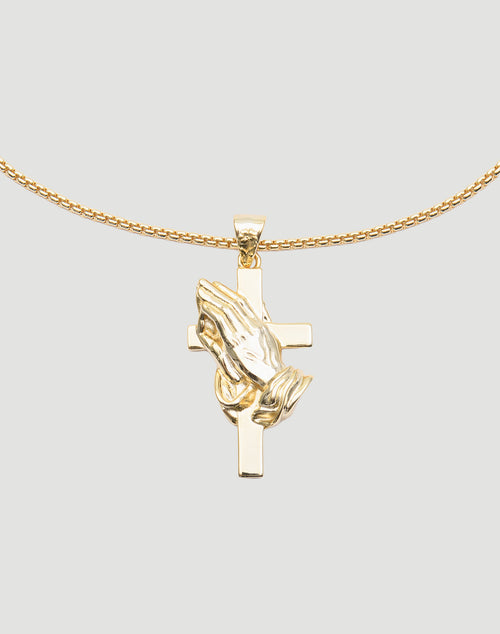 The LFDY Praying Chain by LIVE FAST DIE YOUNG features a vergoldet pendant with praying hands over a cross, displayed on a classic box chain against a plain light gray background.