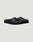 The LFDY Mules by LIVE FAST DIE YOUNG are black slip-on clogs with closed toes, textured PU Sohle, and schwarze Innenmaterial, shown on a plain light gray background.