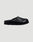 The LFDY Mules by LIVE FAST DIE YOUNG are black slip-on mule shoes with a rounded toe, flat back, thick ridged EVA sole, and schwarze Innenmaterial, shown against a plain light grey background.