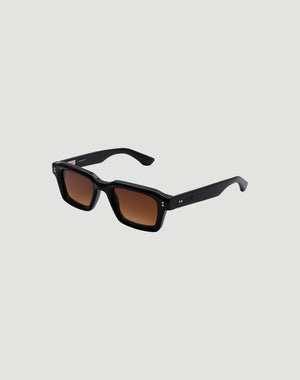 The LFDY x Chimi Shades 03 by LIVE FAST DIE YOUNG are black rectangular sunglasses with dark brown gradient CR39 lenses and UV protection, shown on a light gray background.