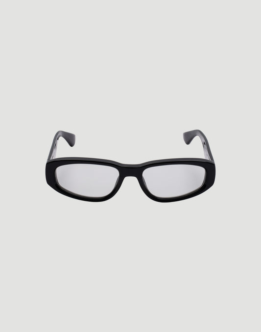 Front view of LIVE FAST DIE YOUNG LFDY x Chimi Shades 09, black rectangular frame with clear photochromic lenses offering UV protection, displayed on a plain light gray background.