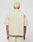 A person with short, bleached blonde hair is shown from behind, wearing the LIVE FAST DIE YOUNG LFDY Twill Shirt and matching shorts made from 100% cotton, set against a plain white background.