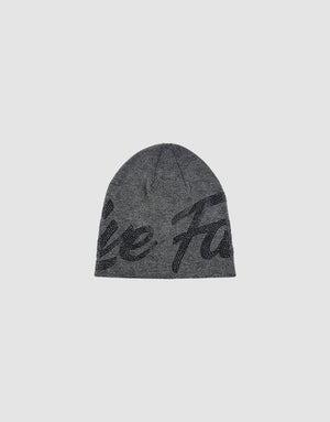 The LFDY Jacquard Rhinestone Beanie by LIVE FAST DIE YOUNG features black cursive lettering and subtle rhinestones on a gray knit, shown against a plain light gray background.