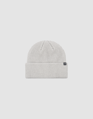 The Double Rib Knit Beanie by LIVE FAST DIE YOUNG is a light gray, doppellagig gestrickt hat with a folded cuff and a small black rectangular tag, shown on a plain white background.