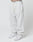 A person wears Basic Loose Jogger sweatpants by LIVE FAST DIE YOUNG, featuring a loose fit, light gray color, elastic waistband, and visible LIVIN branding. Theyre paired with white sneakers and posed against a plain white background.