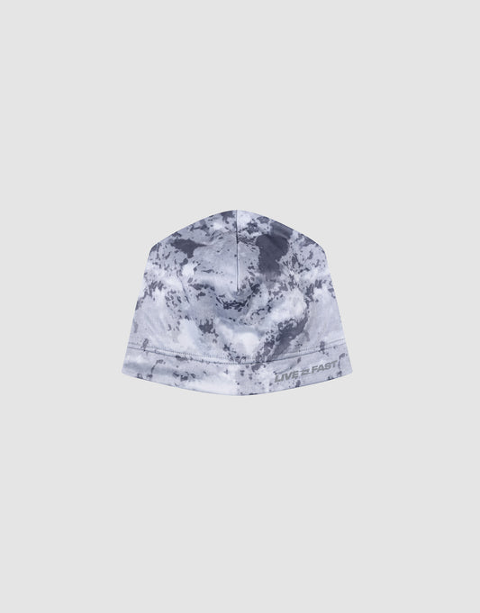 The Live Fast Performance Beanie by LIVE FAST DIE YOUNG features gray and white camo, a soft fleece lining, and “LIVE FAST” printed near the edge, shown against a plain light background.