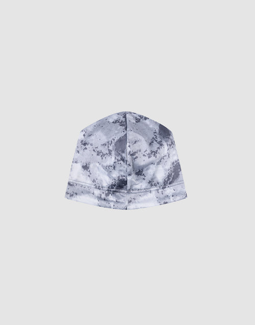 The LIVE FAST DIE YOUNG Live Fast Performance Beanie, featuring a gray and white tie-dye design and fleece lining, is displayed from the back against a light gray background, showing the vertical center seam.