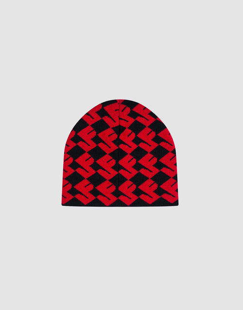 The LF Monogram Beanie by LIVE FAST DIE YOUNG is a soft Polyacryl red and black beanie with a bold geometric zigzag design and Jacquard Monogram, shown on a plain light grey background.