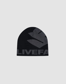 The Live Fast LF Beanie by LIVE FAST DIE YOUNG is a black polyacryl hat with jacquard artwork, featuring a large gray abstract logo and the bold partial word "LIVEFA" on the front (style LF2603-20084), shown on a light gray background.