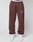 Someone wears maroon Wide Cuff Jogger by LIVE FAST DIE YOUNG, featuring "Live Fast" text on the left thigh and elastic waistband, paired with white sneakers against a plain backdrop.