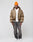 A man in the LFDY Winter Bomber Jacket by LIVE FAST DIE YOUNG, a white t-shirt, dark gray jeans, white sneakers, and an orange beanie stands against a plain light background, looking to his side with a neutral expression.