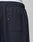 Close-up of the back pocket area of dark navy LFDY Striped Jogger sweatpants by LIVE FAST DIE YOUNG, featuring an elastic waistband and a small black HEY tag. The white waistband of underwear is slightly visible above the pants.