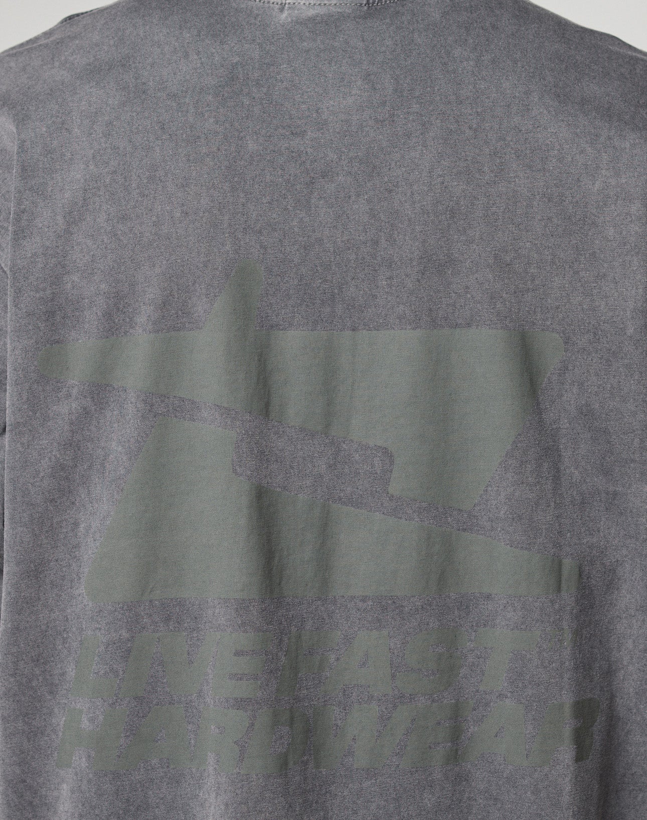 The LFDY Hardwear Tee by LIVE FAST DIE YOUNG is a faded gray oversized cotton t-shirt featuring bold front and back prints, including a large abstract geometric graphic and "LIVE FAST HARDWEAR" on the back.