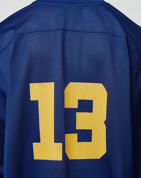 A close-up of the back of the blue LIVE FAST DIE YOUNG LFDY Mesh Jersey, featuring an oversize fit and the number 13 in large yellow print.