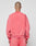 A person with a shaved head faces away from the camera, wearing the oversize Basic LiveFast Sweater and matching sweatpants by LIVE FAST DIE YOUNG in faded pink, set against a plain light gray background.