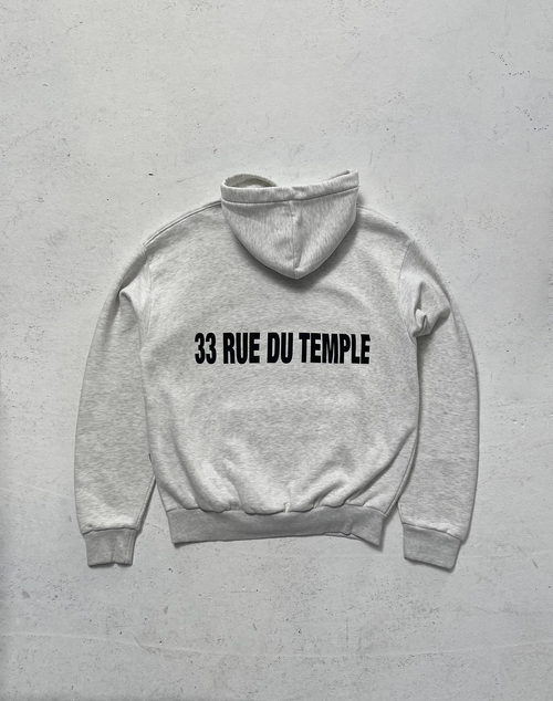 The LFDY Family & France Hooded by LIVE FAST DIE YOUNG is an oversized light gray cotton hoodie, laid flat on a white surface, with front and back prints including bold black "33 RUE DU TEMPLE" text on the back.