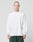 A person with a shaved head wears the LIVE FAST DIE YOUNG Basic Script Waffle Longsleeve in white and dark green pants, standing against a light gray background with a neutral expression.