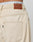 A close-up of the back of the LFDY Baggy Denim by LIVE FAST DIE YOUNG shows beige denim in a baggy fit, a brown leather patch with LIVE FAST D Y, and part of a white waistband displaying LIVE FAST.