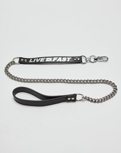 The LFDY Dog Leash by LIVE FAST DIE YOUNG features an Edelstahl metal chain, leather details with a black handle, and a black tag reading LIVE FAST in bold white letters, shown against a plain white background.
