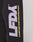 A close-up of black Baumwolle fabric shows large purple LFDY letters outlined in yellow with LIVEFASTDIEYOUNG.COM printed vertically. The LFDY Racing Wide Jogger by LIVE FAST DIE YOUNG features a wide fit and elastic waistband for comfort and style.