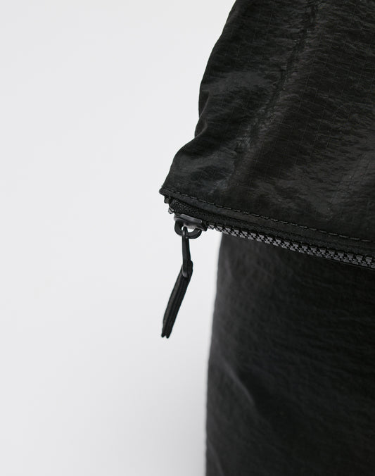 Close-up of the LIVE FAST DIE YOUNG Live Fast Paintbag, a black nylon bag with a zipper partially closed and the pull tab visible against a plain white background.
