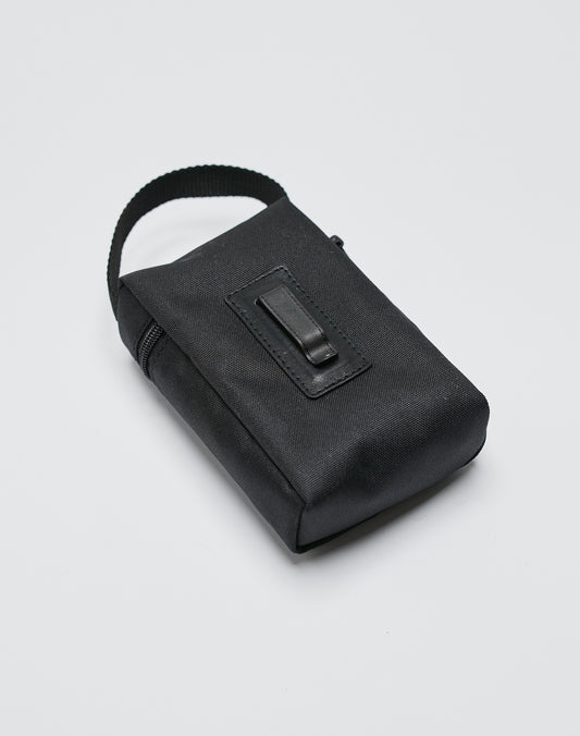 The LIVE FAST DIE YOUNG Live Fast Paintbag is a small black rectangular nylon bag with a fabric handle, zipper closure, and front clip, perfect for carrying spray cans. Shown on a plain white background.