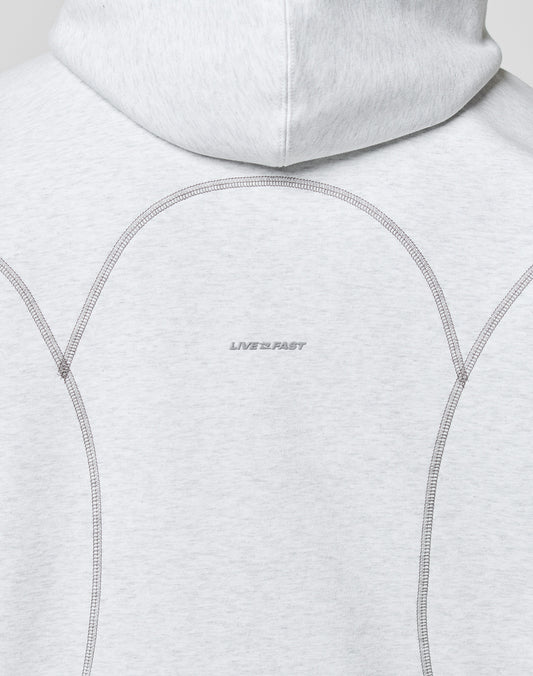 Back of the LFDY Active Fleece Hooded Zip by LIVE FAST DIE YOUNG in light gray, oversize fit with curved seams, soft Baumwolle. Features a subtle logo and LIVE 2 FAST text at the center.
