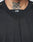 Close-up of a person wearing the LIVE FAST DIE YOUNG Basic Mesh Jersey with LFDY on the collar in an oversize fit. A black symmetrical tattoo is visible on their upper chest, just below the neck.