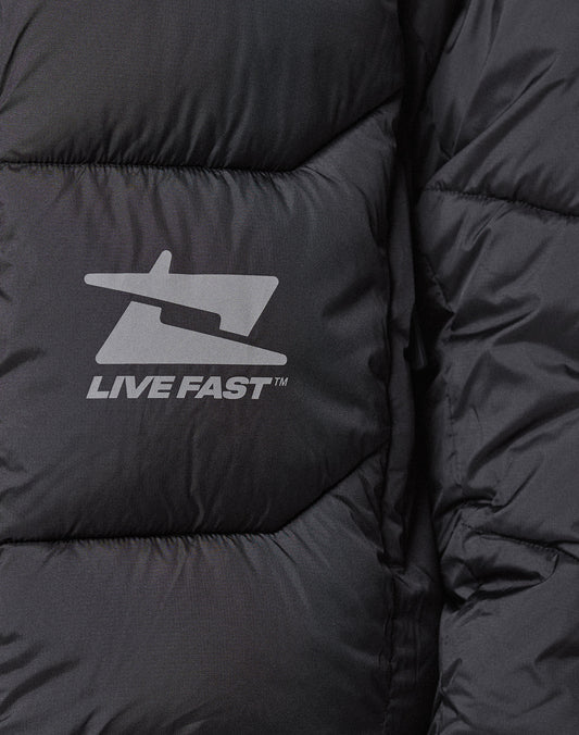 Close-up of the Live Fast Puffer Jacket by LIVE FAST DIE YOUNG, a black quilted jacket with a stylized jet logo and LIVE FAST™ in white reflektierender Print for enhanced visibility.
