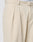 Close-up of beige Wide Chino trousers by LIVE FAST DIE YOUNG in 100% cotton, featuring a soft, slightly textured fabric, Doppel-Bundfalte waistband with belt loops, front pleats, and a side pocket.