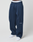 Wearing LFDY Active Fleece Jogger by LIVE FAST DIE YOUNG in wide fit navy blue with black seam details and a white LIVE FAST logo near the left knee, paired with white sneakers and visible LIVE FAST DIE YOUNG underwear waistband.