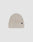 The LIVE FAST DIE YOUNG Washed Rib Knit Beanie is a light grey, one-size ribbed knit with a folded cuff and small black flag-label, made from soft polyamide, shown against a plain white background.