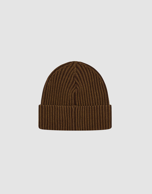 The LIVE FAST DIE YOUNG Washed Rib Knit Beanie is a brown, 100% Baumwolle hat with a folded cuff, shown on a light gray background. One size for easy comfort and style.