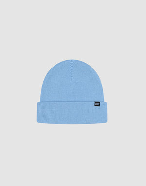 The LIVE FAST DIE YOUNG Basic Beanie in light blue, One Size, features a folded brim and small black flag-label on the cuff. Made from soft polyamide. Displayed against a plain white background.