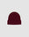 The LIVE FAST DIE YOUNG Basic Beanie is a plain, deep burgundy knit with a folded brim and subtle flag-label detail, crafted from soft polyamid and shown against a light grey background.