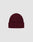 The LIVE FAST DIE YOUNG Rib Knit Beanie in maroon, One Size, features a folded brim and subtle flag-label, crafted from soft polyamid ribbed knit, shown on a plain light grey background.