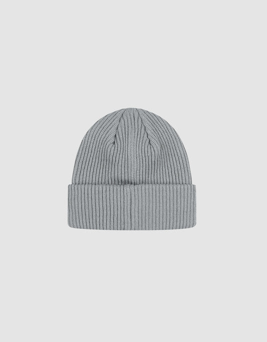 The LIVE FAST DIE YOUNG Rib Knit Beanie, in light gray polyacryl with a ribbed design and folded cuff, is shown centered on a plain white background. One size for easy style and comfort.