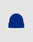 The LIVE FAST DIE YOUNG Basic Beanie is a bright blue, one size polyacryl knit with a folded brim and a black flaglabel with white text on the left side, shown on a plain light gray background.