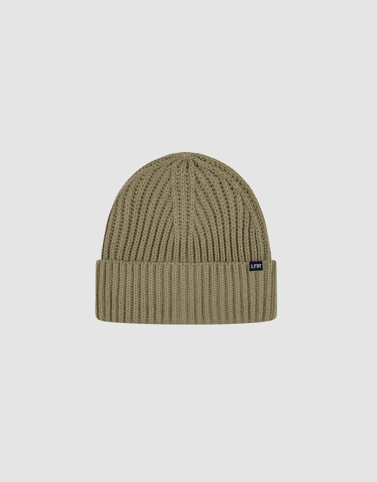 The LIVE FAST DIE YOUNG Rib Knit Beanie is a khaki green, one-size, ribbed knit hat with a folded brim, made from soft Polyamid. It features a small black flag-label tag on the side and is shown against a light gray background.