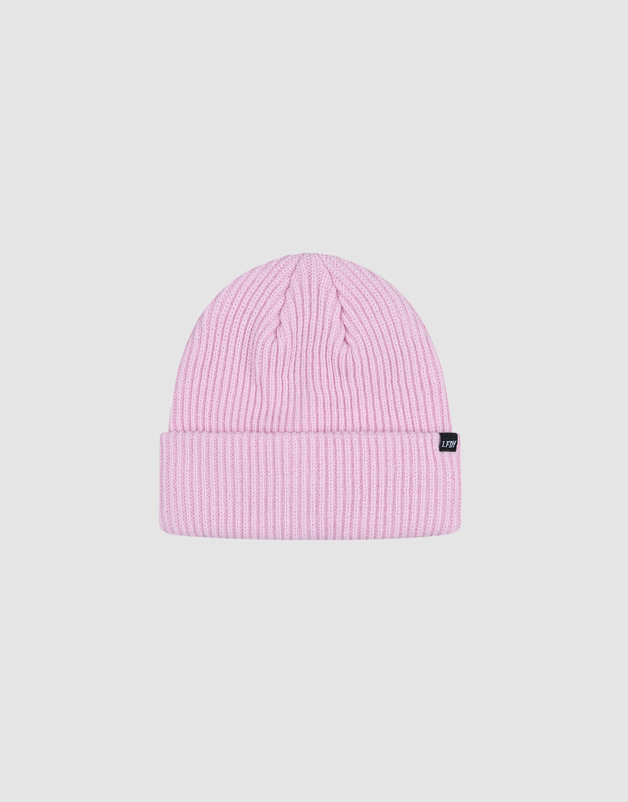 The LIVE FAST DIE YOUNG Double Rib Knit Beanie features a light pink ribbed polyamide design, folded cuff, and a small black side flag-label, shown against a plain white background.
