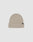 A beige Basic Beanie by LIVE FAST DIE YOUNG, crafted from soft polyamide with a folded brim and a small black LIFON flag-label, displayed on a plain light grey background.