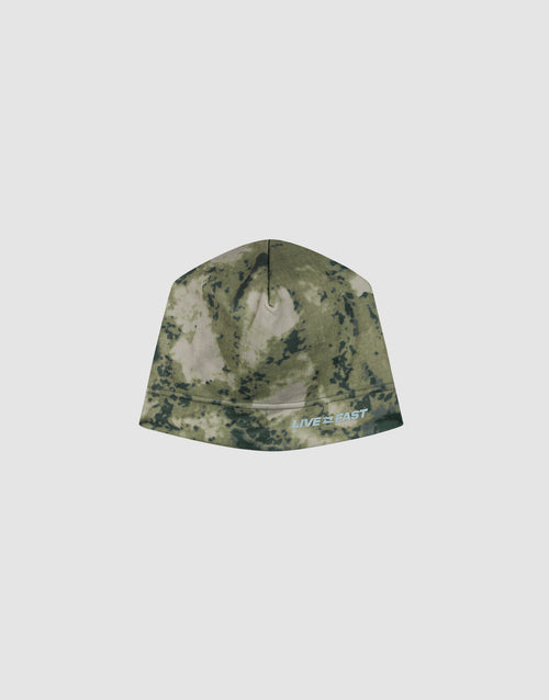 The Live Fast Performance Beanie by LIVE FAST DIE YOUNG features a green and beige camo print, a cozy fleece lining, and a white and blue "LIVE FAST" logo near the edge, displayed on a plain light gray background.