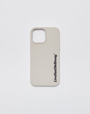 The Basic Phone Case by LIVE FAST DIE YOUNG features a beige TPU cover, large rectangular camera cutout, and Live & Let Die Young in black vertical text on one side. The design sits against a plain white background for added style.