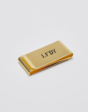 The Basic Money Clip by LIVE FAST DIE YOUNG, made from stainless steel and featuring the engraved LFDY logo on top, is shown on a plain white background.